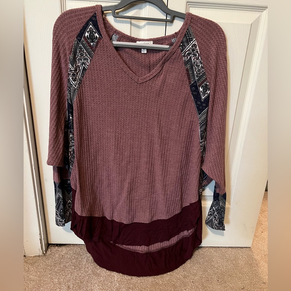 Umgee med top would fit a large